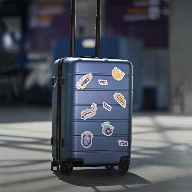 Luggage with stickers
