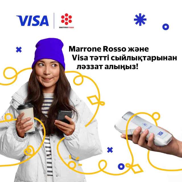 A woman with a coffee and smartphone in her hands