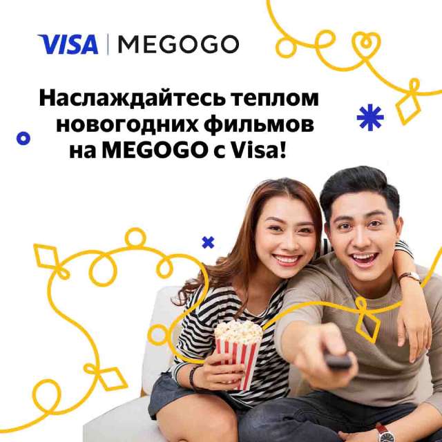 A man and a woman watching TV and eating popcorn