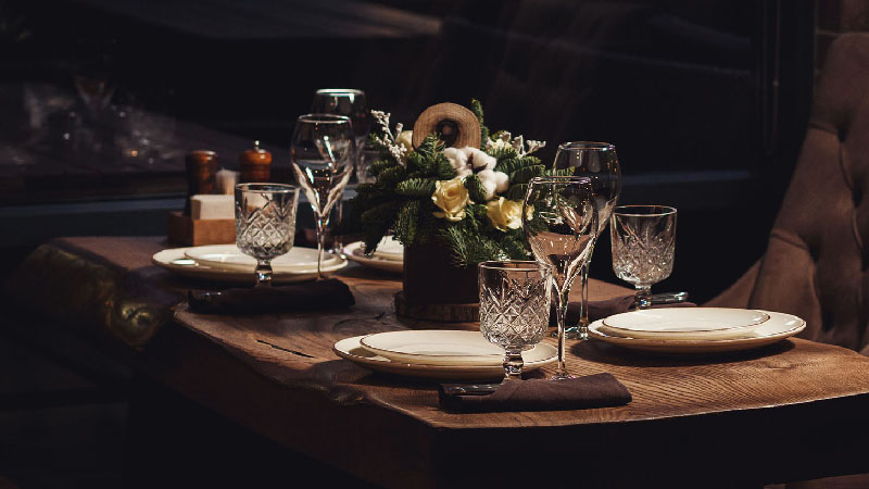 sun-group-restaurant-800x450 Table set in the restaurant with wine glasses and plates